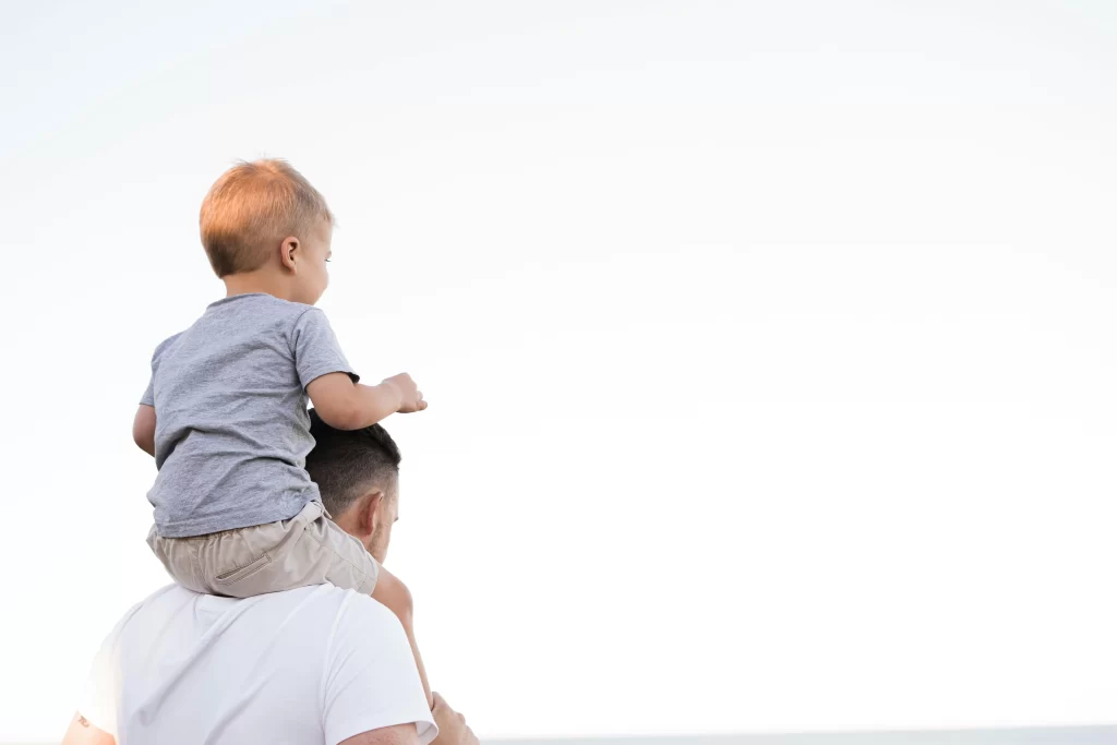A single dad with his child conceived through surrogacy